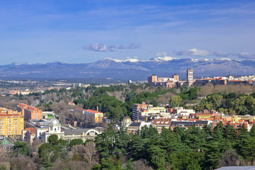 Fototapeta na wymiar Aerial view of Madrid with Guadarrama Mountains on background