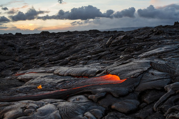 Lava Fields with Active Flow at Sunrise on Hawaii