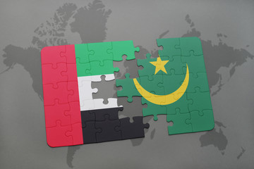 puzzle with the national flag of united arab emirates and mauritania on a world map
