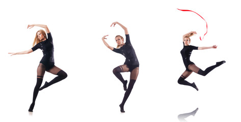 Young woman dancing on white background