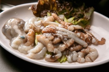 sliced raw octopus