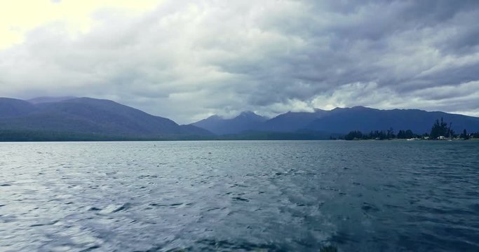 Aerial view of wooden pier on big lake in Te Anau, New Zealand.  