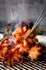Grilled Small Octopus on a Hot Plate