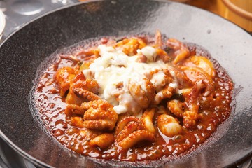 Grilled Small Octopus on a Hot Plate
