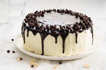 round cake with chocolate topping.