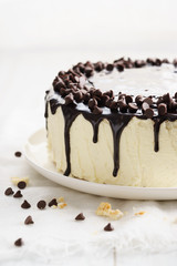 round cake with chocolate topping.