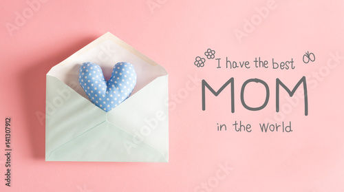 Mother's Day message with a blue heart cushion