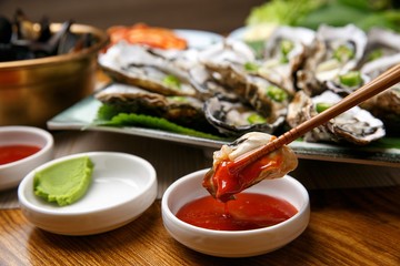 oyster with red paper  chili sauce