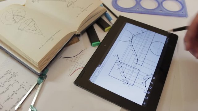Close-Up Of Hands Designer Woman Using Tablet