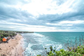 Sunset over ocean from the cliff. Tropical island Bali, Indonesia.