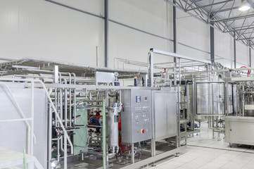 the panel with the dashboard in factory  manufacture and bottling of drinks in tin cans. production and bottling of drinks in tin cans