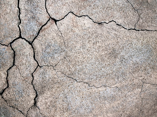 old cracked concrete wall gray texture as background