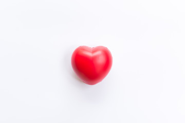 Red heart on isolated background.Top view