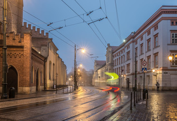 Fototapeta premium Krakow, Poland, st Francis church and tram light trails