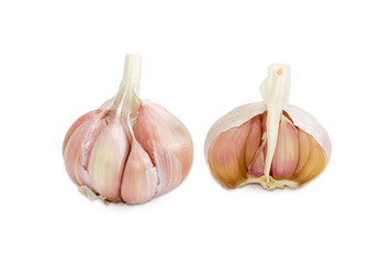 Two garlic bulbs on a light background