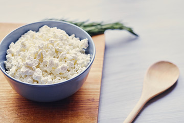 Creamy curd in a cup on a table.