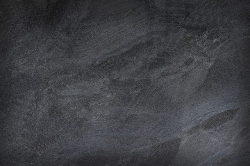 Dark grey black slate background or texture.