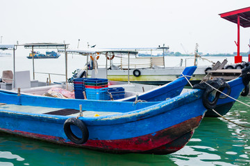 Naklejka premium Boats near Malaysia tropic beach