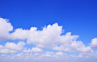 Naklejka na ściany i meble The vast blue sky clouds