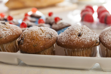 Morning awakening : breakfast with muffins and other sweet bakery. Italy Bed and Breakfast