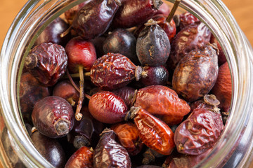 Dry Briar rose in jar, top view, close up, macro