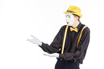 Portrait of a man, an artist, a pantomime. Shows something, isolated on white background