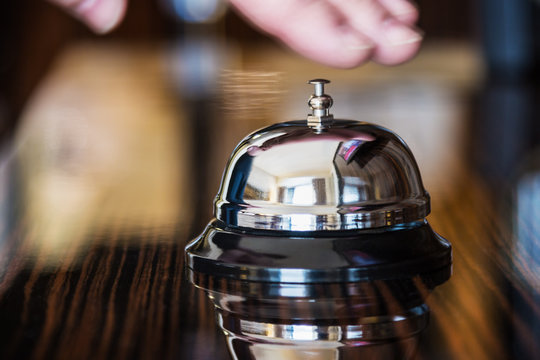 Hotel Concierge. Service Bell In A Hotel Or Other Premises