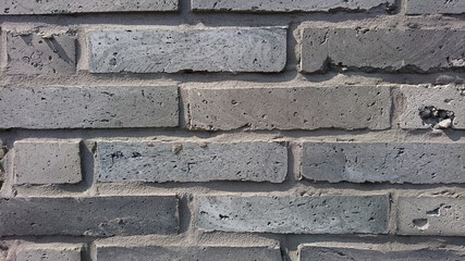rough gray bricks wall background