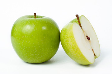 Sliced green apple isolated on white background