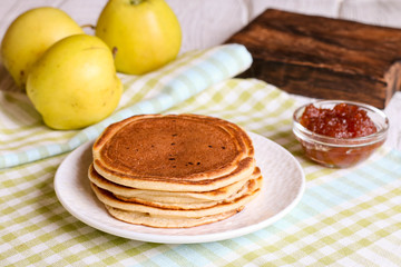 Sweet pancakes made of apple, curd and cinnamon
