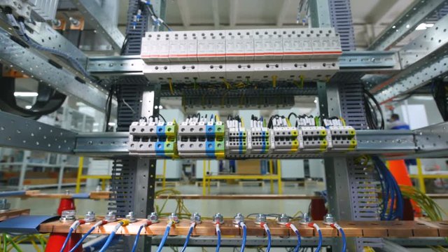 Industrial electric rack. Cables, wires connected with electric equipment. 4K