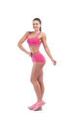 Fototapeta premium Woman fitness model posing in front of camera and showing her muscles. Isolated white background