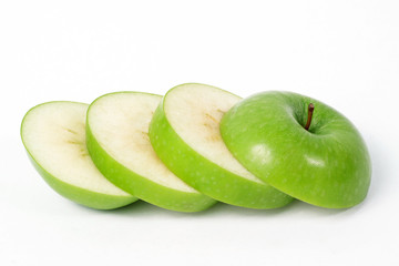 Sliced green apple isolated on white background