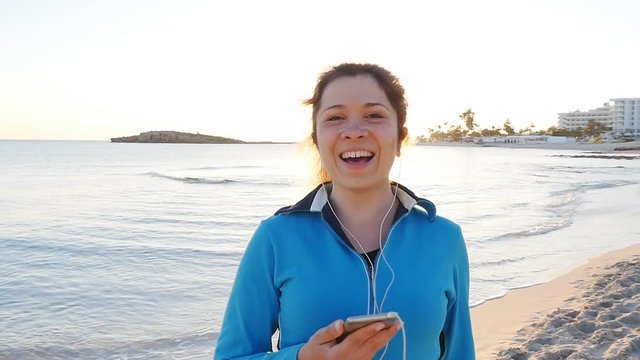 Sporty fitness woman on beach