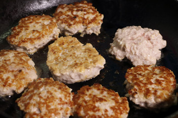 chef fried cutlets, meat minced in frying pan,traditional cooking