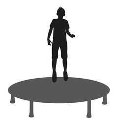 silhouette of a child jumping on a trampoline