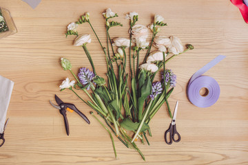 Florist workplace: flowers and accessories © Buyanskyy Production