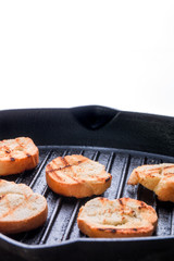 Grilled toast on pan.