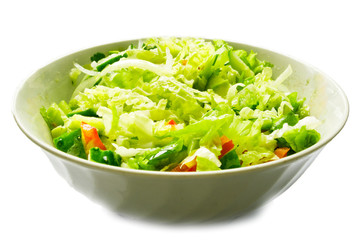 Fresh salad from tomatoes, cucumber, pepper, olive oil, cabbage