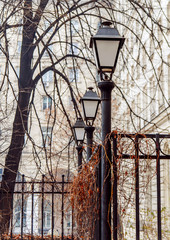 Old vintage street light lamp on black rod
