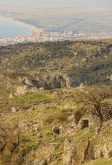 Adriatic coast: the Gulf of Manfredonia.ITALY (Apulia). Gargano promontory: panoramic view from Monte Sant'Angelo. Rural landscape with trullo and pasture.
