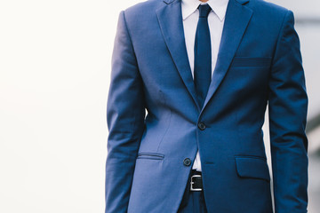 asian business man in suit on a cityscape background
