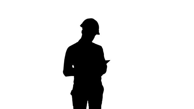 Silhouette Civil engineer filing in inspection form