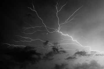lightning passed over the cloud - black and white