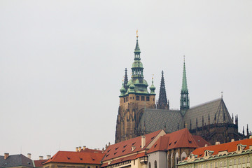 View of Hradcany roofs with St. Vitus Cathedral and Castle of Prague, Czechia.