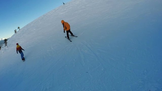 Man Descent on skis from the snow mountains