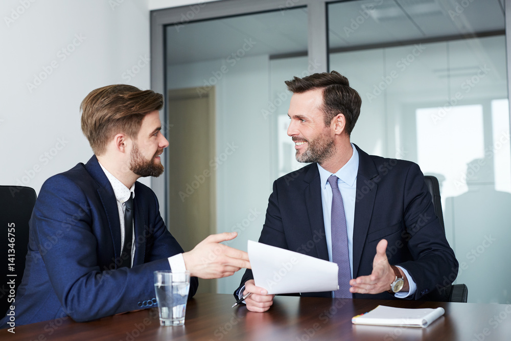 Canvas Prints job interview - happy recruiter talking with candidate