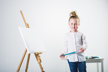 Color images painted by a beautiful blond girl on a white background.