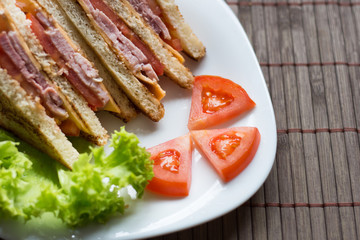 sandwich with cheese, tomato and smoked meat