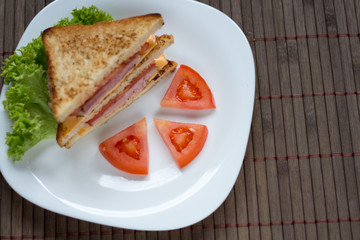 sandwich with cheese, tomato and smoked meat